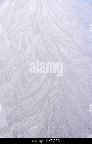 Frost patterns on window Stock Photo