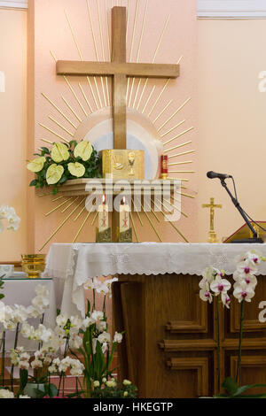 The altar with tabernacle and the cross in the Adoration chapel. Stock Photo