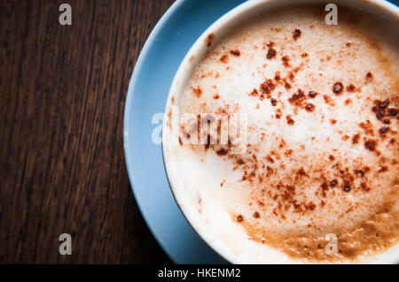 coffee cup on a wooden table, overhead view angle Stock Photo