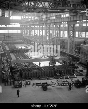 A modern prefabrication method is being used at the Belfast shipyard of Harland and Woolf for the construction of an 80,000-ton tanker for the Sigval Bergesen Company of Norway, the biggest tanker ever built at the yard. This picture in the Prefabrication Shed shows large weldments being prepared for craning to the ship. Stock Photo