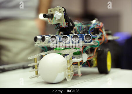 Sofia, Bulgaria - December 17, 2016: A race robot during an open competition of self-made robots among school students. A robot with ping pong ball. Stock Photo