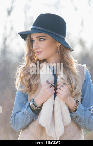 Portrait of a hippie young woman wearing a hat Stock Photo