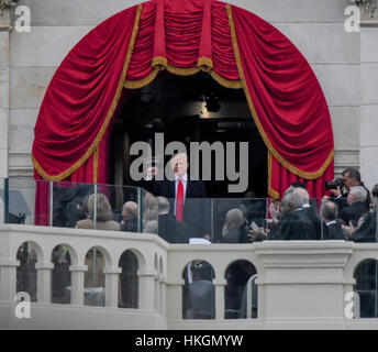 Washington, DC., USA, January, 20th 2017 President Donald Trump gives a raised fist sign as he walks back into the Capitol after delivering his Inaugural address to the nation Photo by  Mark Reinstein Stock Photo
