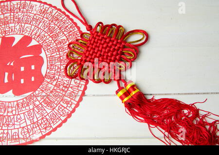 Chinese knot and paper cut for good luck Stock Photo