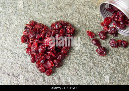 Heart shape made from dry cranberry fruits Stock Photo