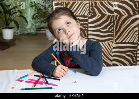 Dreamy child girl with pencils Stock Photo