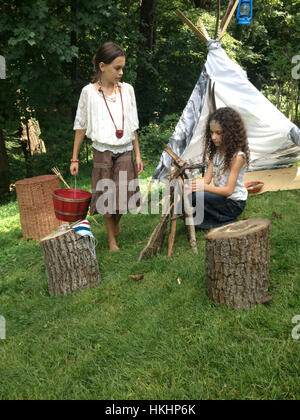 Girls playing native americans Stock Photo