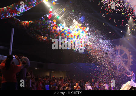 Thousands of balloons and confetti falling at culmination event for TRBC's Vacation Bible School in Lynchburg, Virginia, USA. Stock Photo