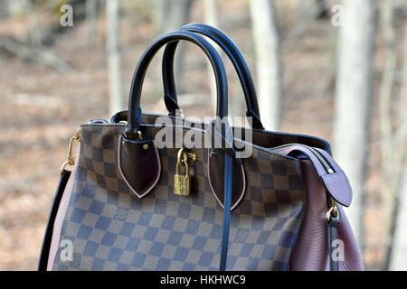 Louis Vuitton Neverfull bag clasp Stock Photo - Alamy