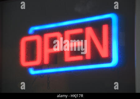 neon 'open sign in window of fast food restaurant Stock Photo