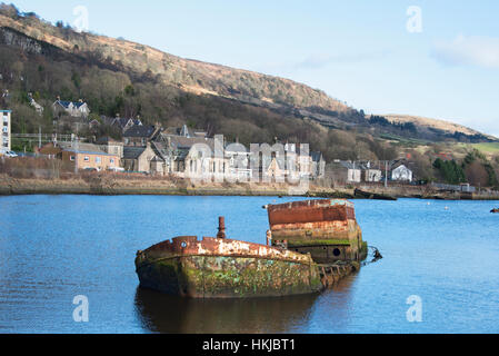 An old decaying derelict boat at Bowling harbour on the river Clyde, Scotland Stock Photo