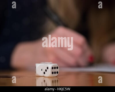 Playing a game with dice Stock Photo