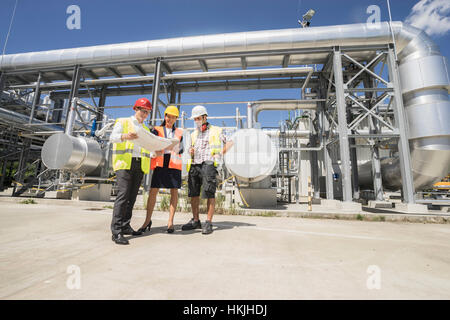 Engineer with his colleagues in meeting at geothermal power station, Bavaria, Germany Stock Photo