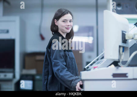Print worker working in an industry, Freiburg im Breisgau, Baden-Württemberg, Germany Stock Photo