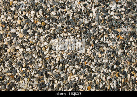 Seamless background texture of red granite chips panel Stock Photo