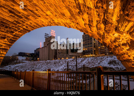 Gold medal Flower sign on the Mill City Museum framed by the Stone Arch Bridge in downtown Minneapolis, Minnesota. Stock Photo