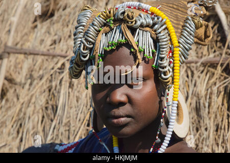 Mursi tribe people in traditional clothing, Mursi Village, South Omo, Ethiopia Stock Photo