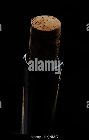 Macro of wine cork in bottle on black background Stock Photo