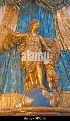 VIENNA, AUSTRIA - DECEMBER 19, 2016: The polychrome carved statue of archangel Raphael in church Mariahilfer Kirche by unknown artist of 18. cent. Stock Photo