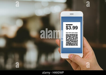 Fintech concept, paying for goods and services by smartphone using E-Wallet and E-Money. Stock Photo