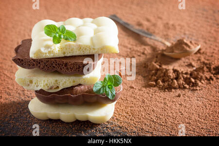 Chocolate bubbles mix. Chocolate background. Chocolate a tower bubbles mix and coffee beans. Stock Photo