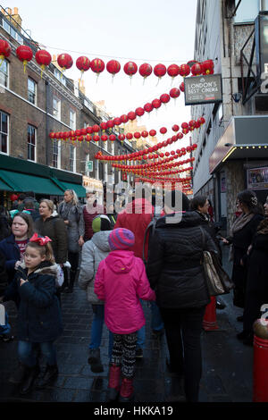 Chinatown London,UK,28th January 2017,Chinese New Year, the year of the Rooster, celebrations take place in London with Chinese Dragons in and around Soho before the main Parade tomorrow©Keith Larby/Alamy Live News Stock Photo