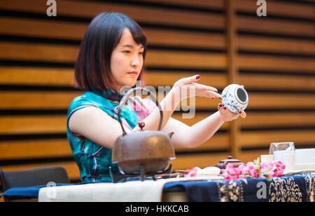 Toronto, Canada. 28th Jan, 2017. A tea master performs Chinese traditional tea ceremony during the 2017 Toronto Tea Festival, featuring tea tastings, tea ceremonies and tea-related products, the two-day event is expected to draw thousands of tea enthusiasts in Toronto. Credit: Zou Zheng/Xinhua/Alamy Live News Stock Photo