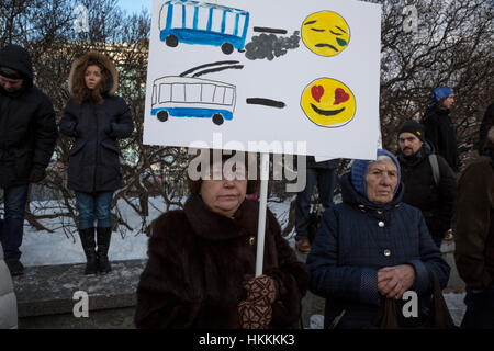 Moscow, Russia. 29th January 2017. Demonstrators hold placards during a protest at Suvorovskaya Square against alleged plans by the Moscow government to reduce the city's trolleybus system, currently the largest in the world Credit: Nikolay Vinokurov/Alamy Live News Stock Photo