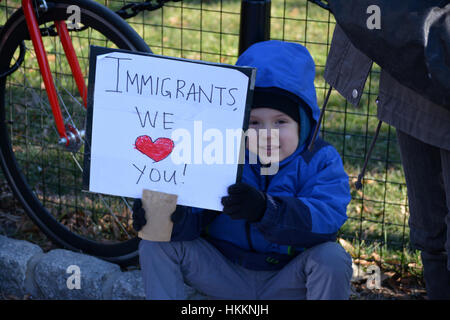 New York City, USA. 29th January, 2017. Protesters take part in the rally against President Trump's immigration plans at Battery Park in New York City.  Credit: Christopher Penler/Alamy Live News Stock Photo