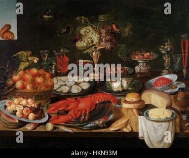 Artus Claessens - An opulent kitchen still life with a lobster, oysters, fruit, cheese and a parrot Stock Photo
