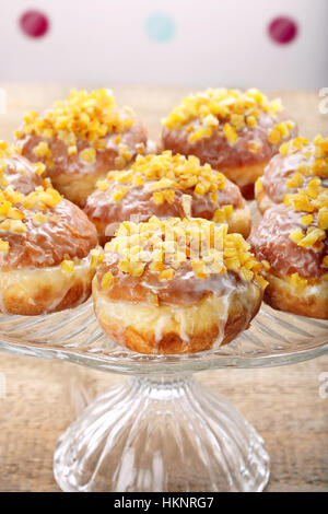 Traditional Polish homemade donuts with rose liqueur and orange and empty space for text Stock Photo