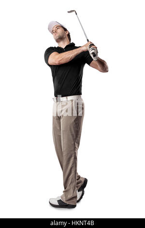 Golf Player in a black shirt taking a swing, on a white Background.