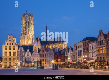 MECHELEN - SEPTEMBER 4: Grote markt and St. Rumbold's cathedral in evenig dusk in Sepetember 4, 2013 in Mechelen, Belgium. Stock Photo