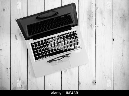 Wooden desk with various gadgets and accessories Stock Photo