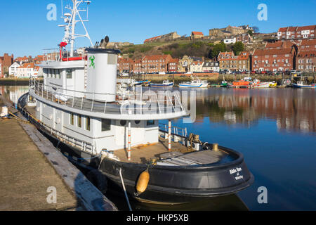Able One a power yacht modelled on an American Tug in its home port of Whitby Stock Photo