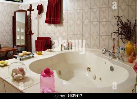 home white empty  jacuzzi bath with accessories around Stock Photo