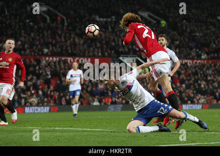 Manchester United's Marouane Fellaini (right) scores his side's first goal of the game during the Emirates FA Cup, Fourth Round match at Old Trafford, Manchester.