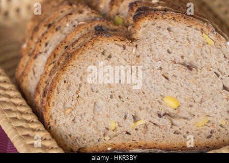 Fresh bread in the wicker basked Stock Photo
