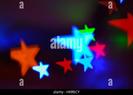 Abstract star patterns against dark background Stock Photo