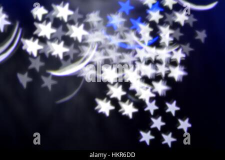 Abstract star patterns against dark background Stock Photo