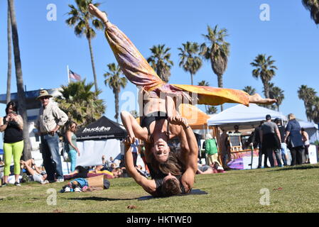 San Diego, USA. 29th January, 2017. Acrobatic yoga at the San Diego Yoga Festival at Ocean Beach in San Diego, California. Credit: John D. Ivanko/Alamy Live News Stock Photo