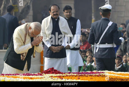 New Delhi, India. 30th Jan, 2017. Indian Prime Minister Narendra Modi (1st L) pays tribute at Rajghat, the memorial of Mahatma Gandhi on his death anniversary in New Delhi, India, Jan. 30, 2017. Gandhi was assassinated on January 30, 1948, while he was walking to a platform from which he was to address a prayer meeting. Credit: Xinhua/Alamy Live News Stock Photo