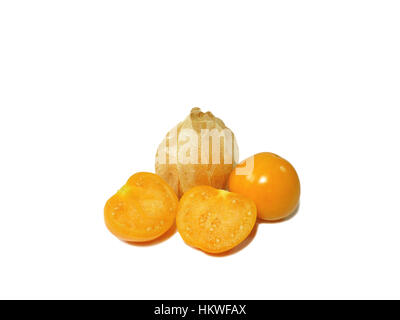 Close-up of bright yellow ripe Cape gooseberries one with calyx one wholeone cut in half isolated on white background Stock Photo