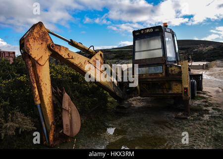 Rust on a disused digger, St Agnes, Cornwall, England Stock Photo