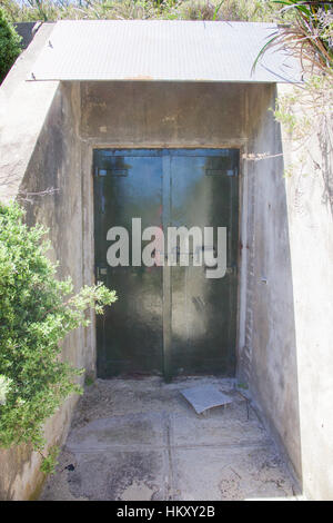 Green metallic underground tunnel entrance at Oliver Hill WWII military installation at Rottnest Island in Western Australia. Stock Photo