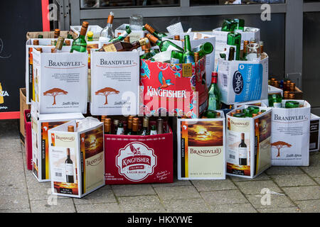 Many empty bottles, wine bottles, in cartons, turned off, for the garbage collection, old glass, glass waste, Stock Photo