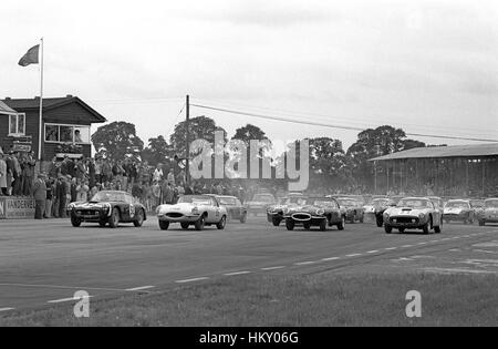 1961 Ferrari 250GTs and Jaguar E Types Start British Empire Trophy Start Silverstone GG Stock Photo