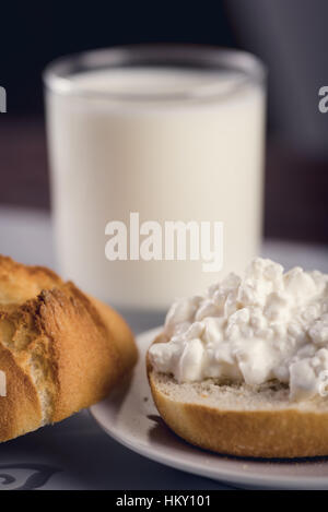 Fresh tasty sandwich make of cut roll and cottage cheese Stock Photo