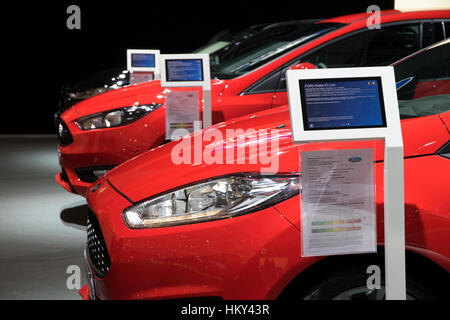 BRUSSELS - JAN 19, 2017: Row of new Ford cars on display at the Motor Show Brussels. Stock Photo