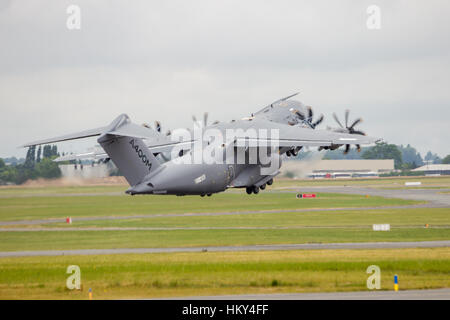 PARIS-LE BOURGET - JUN 18, 2015: New Airbus A400M military transport plane take-off at the 51st International Paris Air show Stock Photo